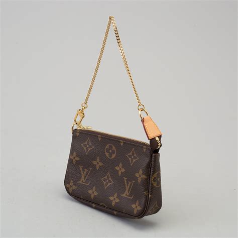 small bag louis vuitton press button